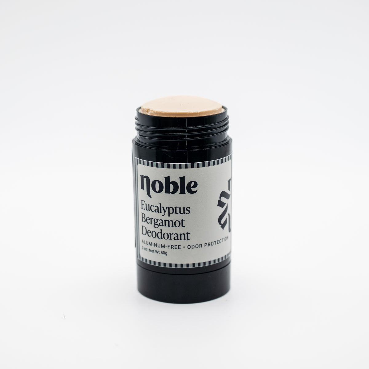 Noble Skin Co. Eucalyptus Bergamot Deodorant 3 oz uncapped black stick showing the deodorant