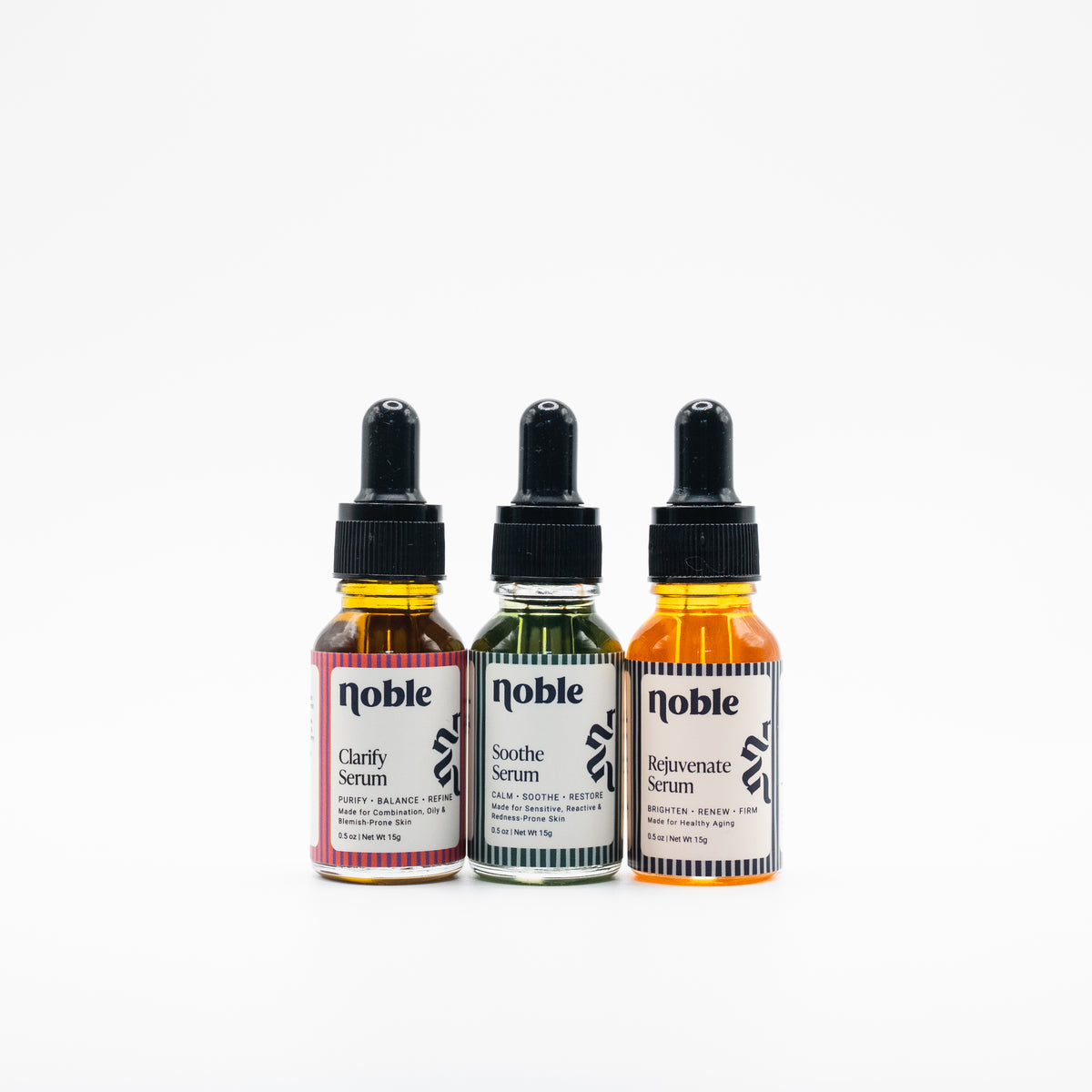 Noble Skin Co. Clarify, Soothe and Rejuvenate Face Serums in three 0.5 oz dropper bottles