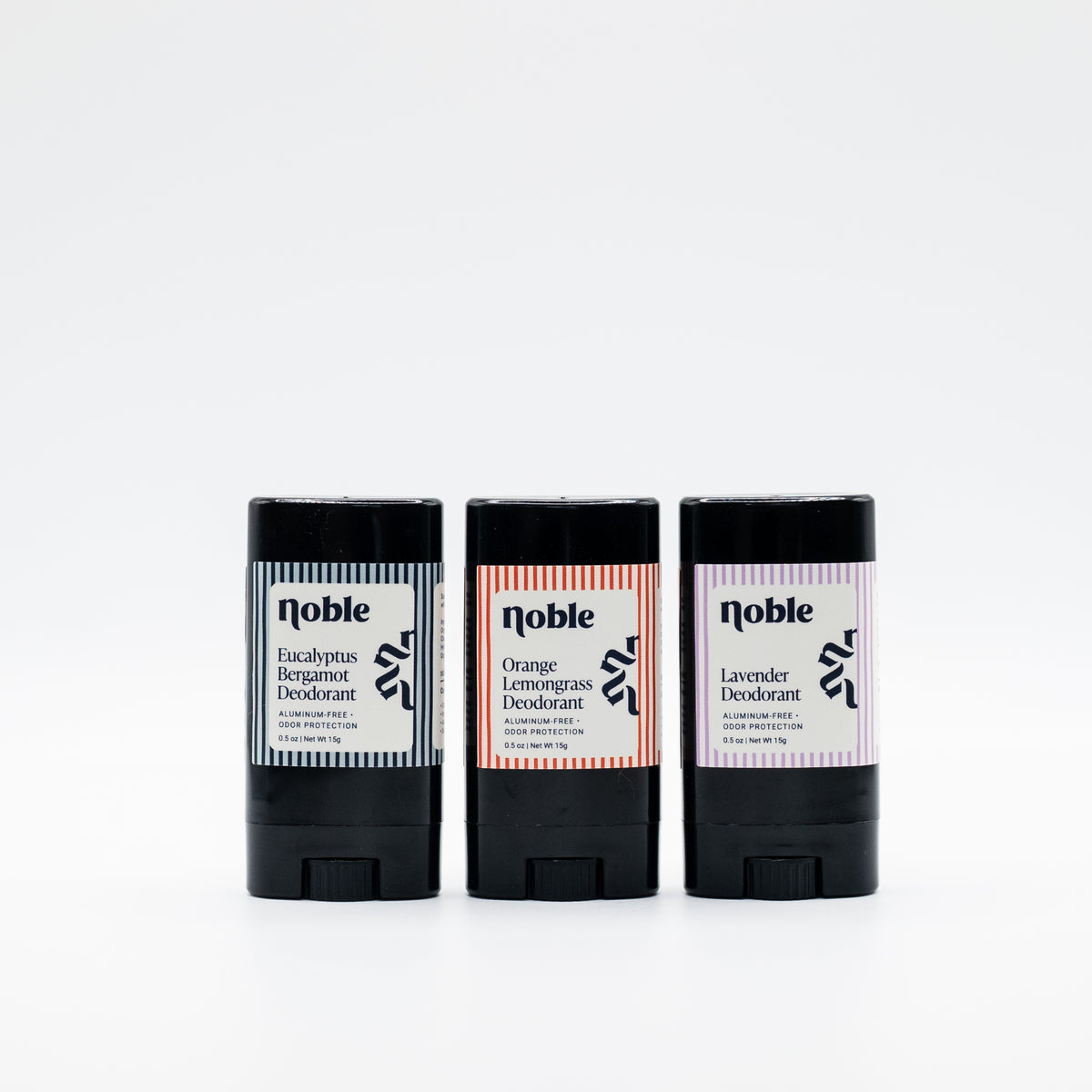 Three example Noble Skin Co. travel deodorants in another assortment
