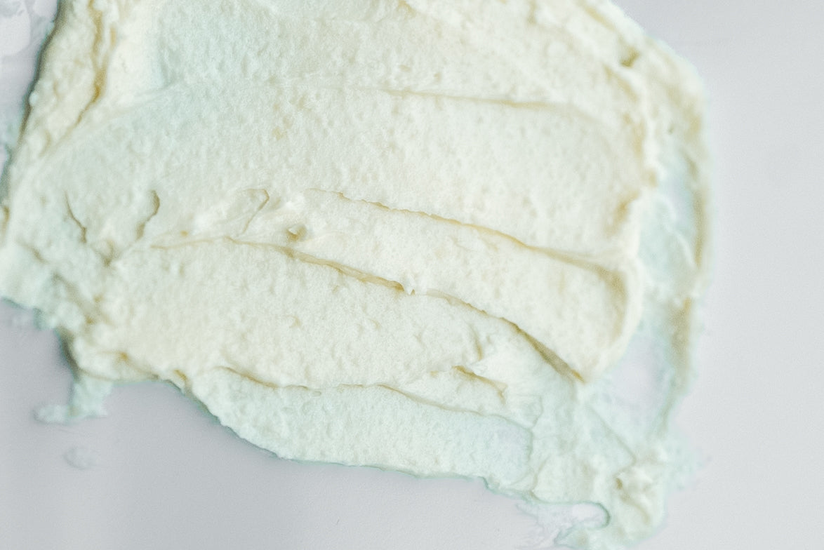 Close-up of pale balm texture.