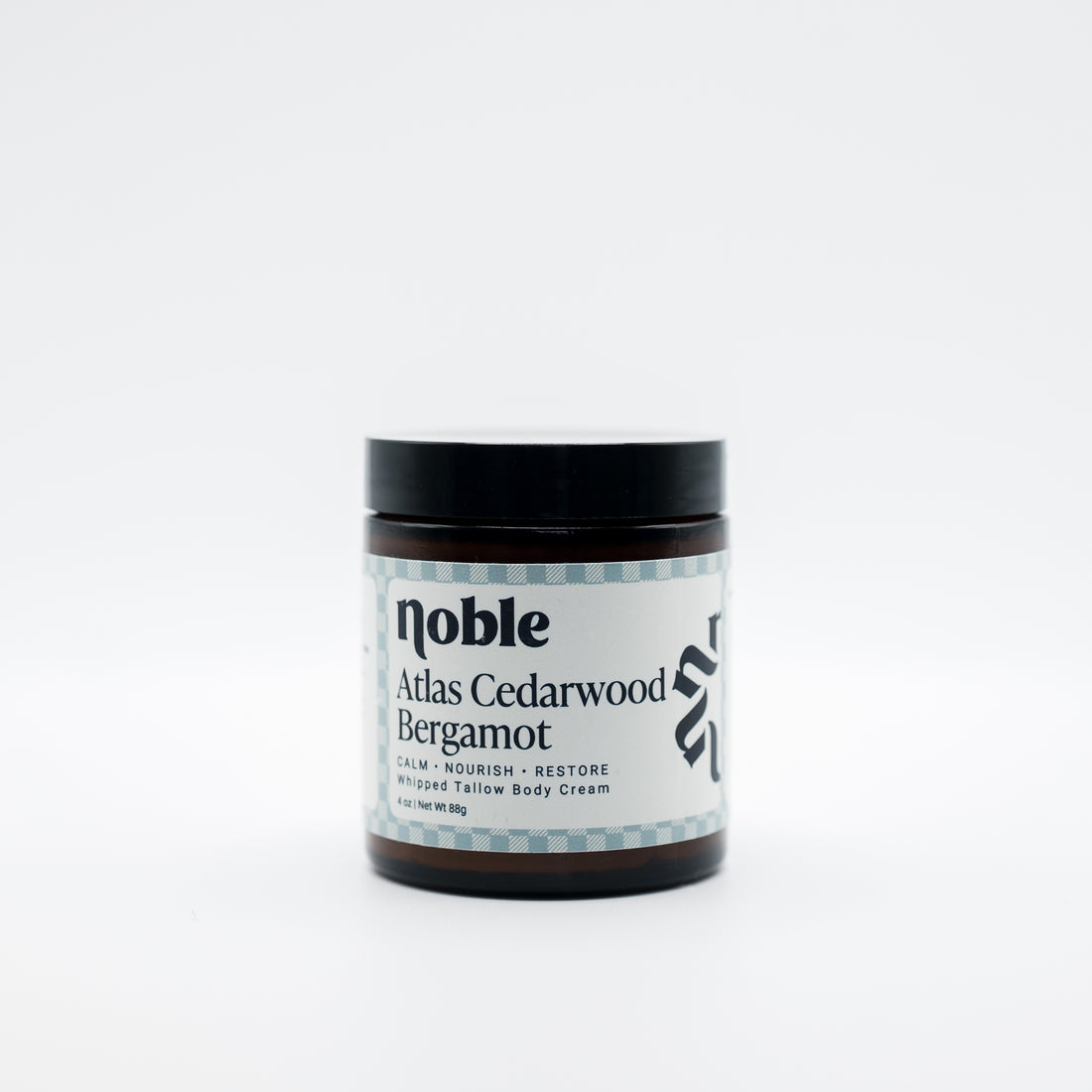 Noble Skin Co. Atlas Cedarwood Bergamot 4 oz amber jar with black lid