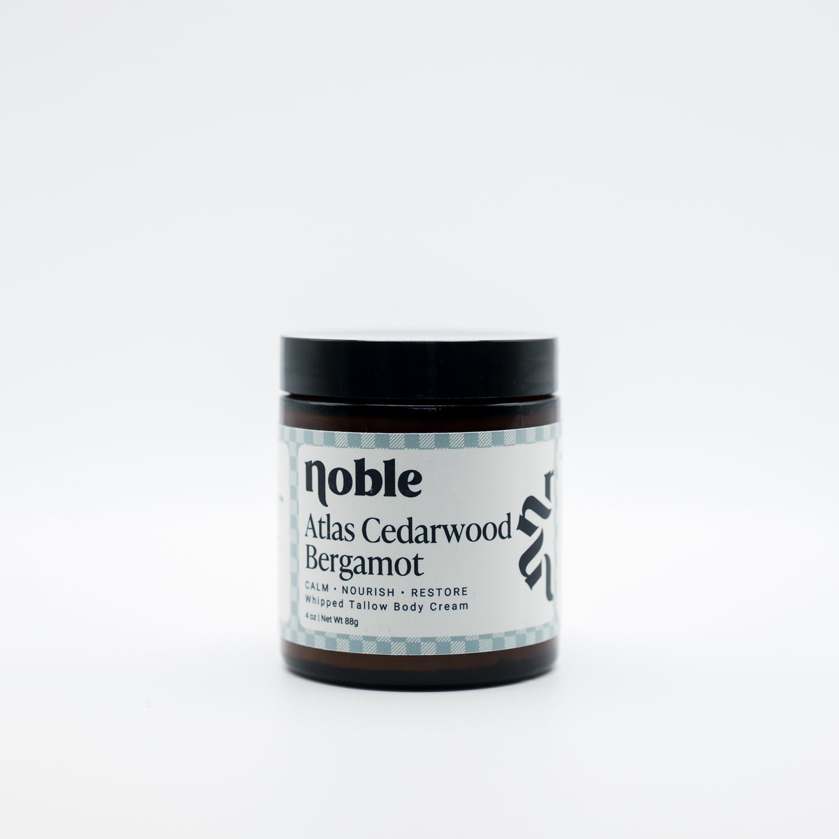 Noble Skin Co. Atlas Cedarwood Bergamot 4 oz amber jar with black lid