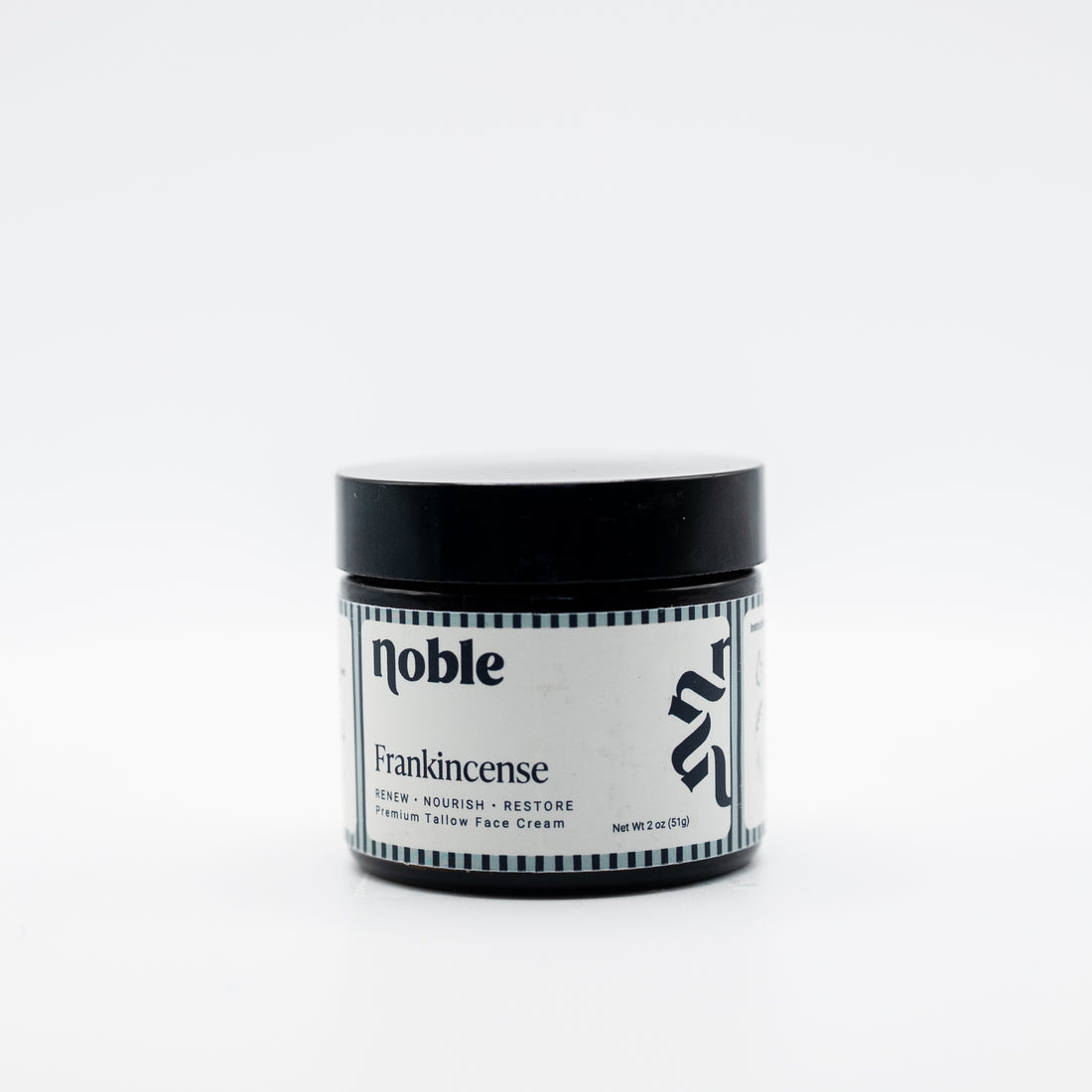Noble Skin Co. Frankincense 2 oz amber jar with black lid