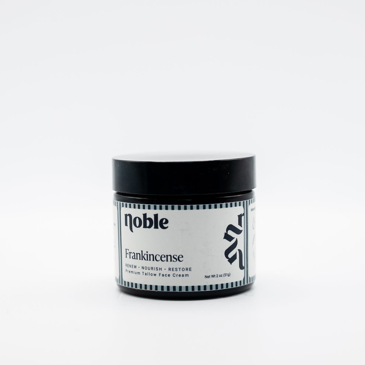Noble Skin Co. Frankincense 2 oz amber jar with black lid