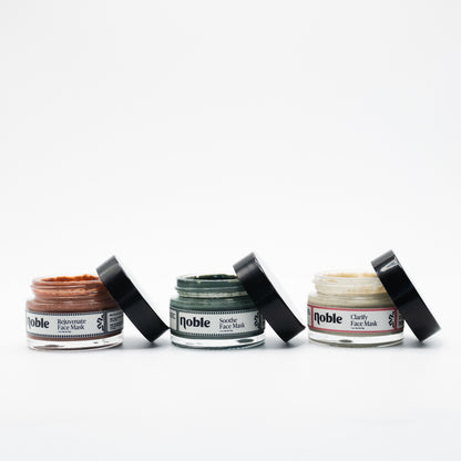 Noble Skin Co. Rejuvenate, Soothe and Clarify Face Masks in open 1 oz jars with lids