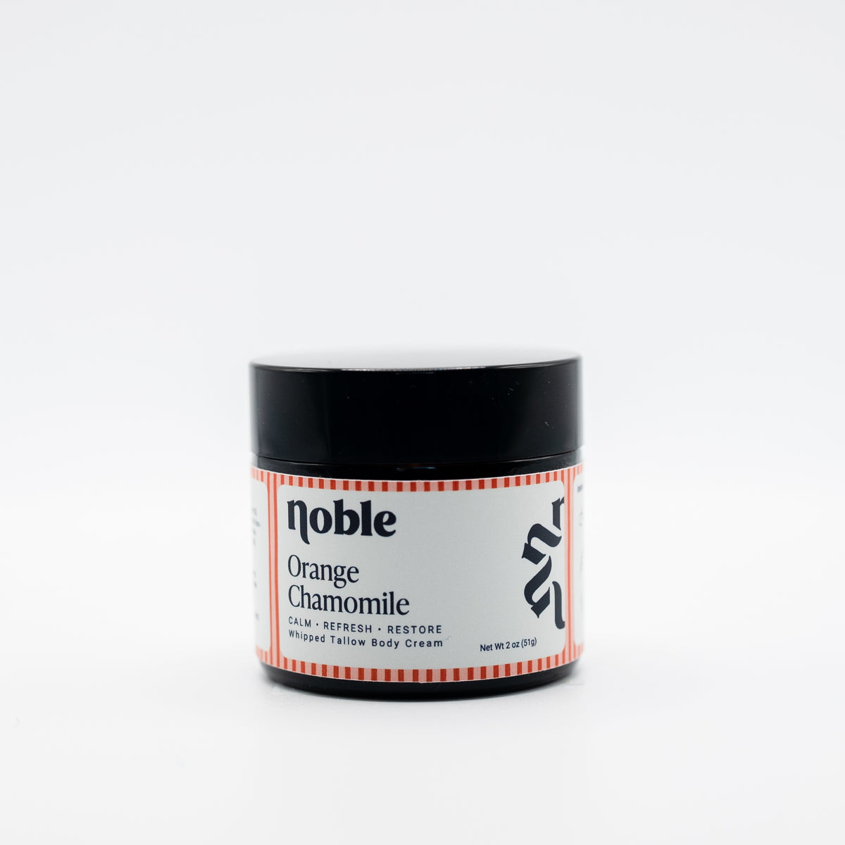Noble Skin Co. Orange Chamomile 2 oz amber jar with black lid