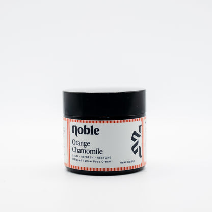 Noble Skin Co. Orange Chamomile 2 oz amber jar with black lid