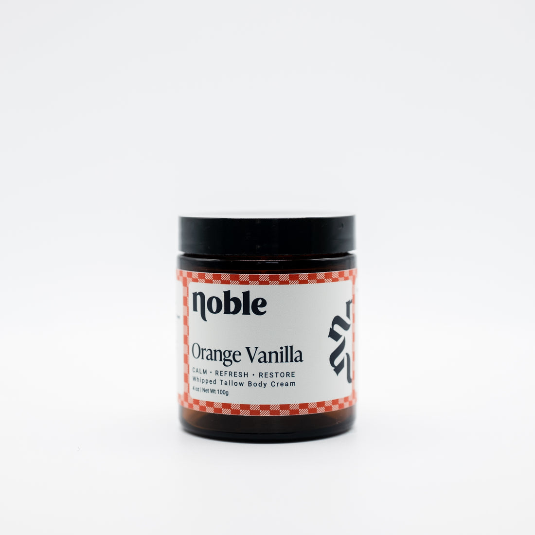 Noble Skin Co. Orange Vanilla 4 oz amber jar with black lid