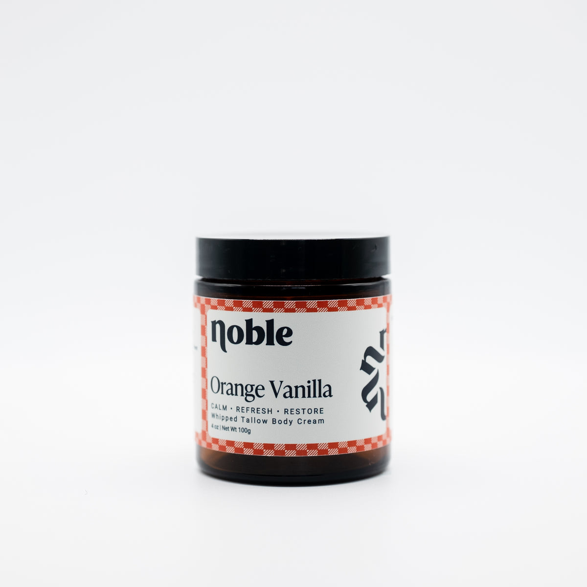 Noble Skin Co. Orange Vanilla 4 oz amber jar with black lid