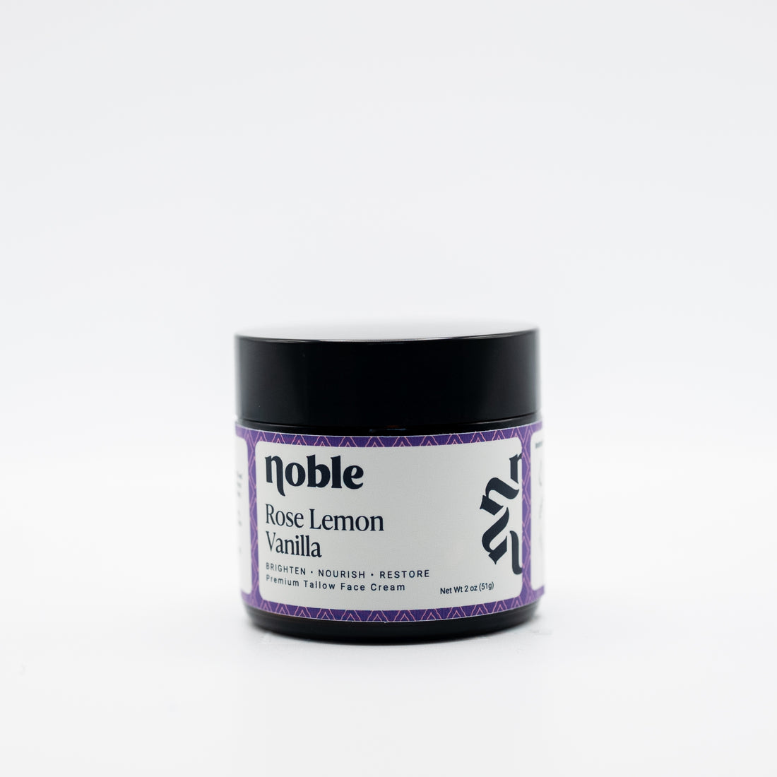Noble Skin Co. Rose Lemon Vanilla 2 oz amber jar with black lid