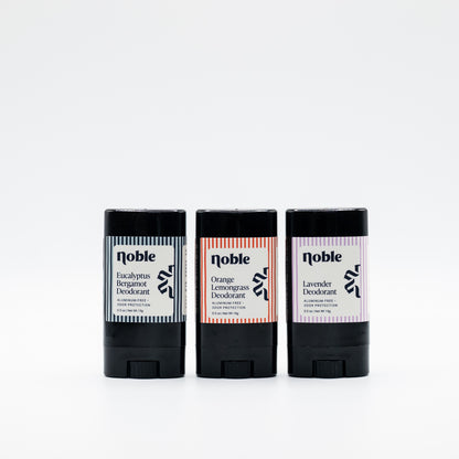 Three example Noble Skin Co. travel deodorants in another assortment