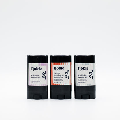 Three example Noble Skin Co. travel deodorants in assorted scents