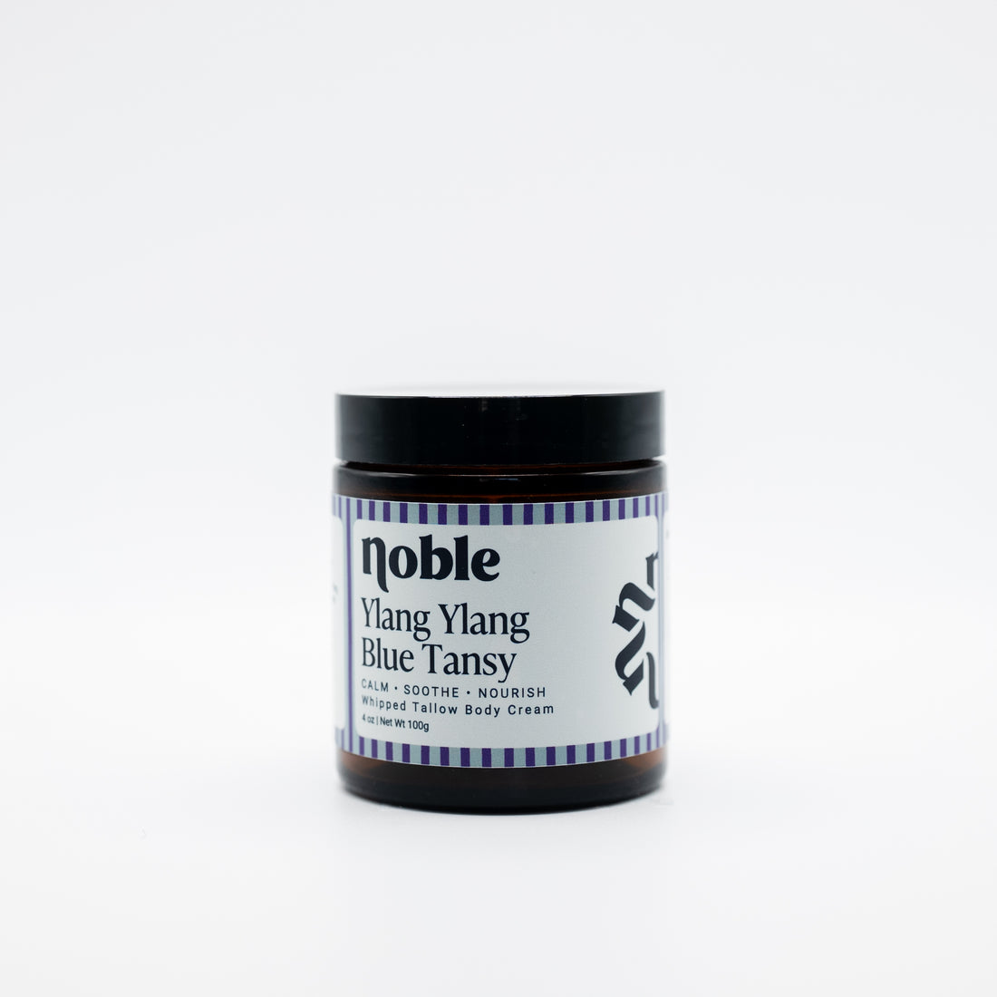 Noble Skin Co. Ylang Ylang Blue Tansy 4 oz amber jar with black lid