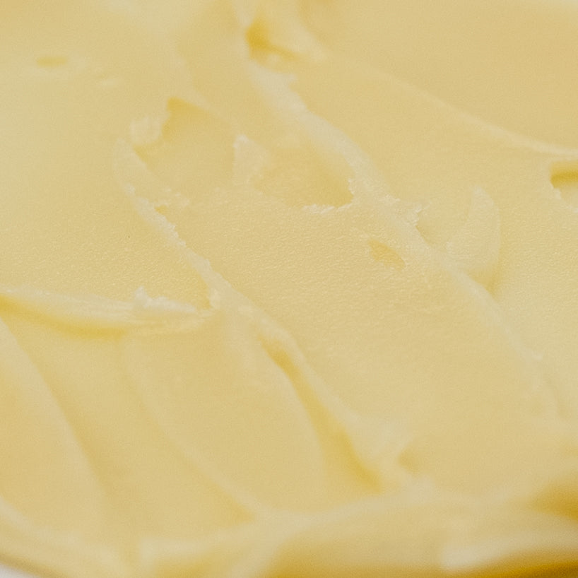 Close-up of pale golden cream texture.
