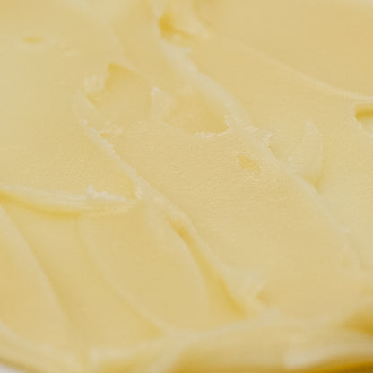 Close-up of pale golden cream texture.