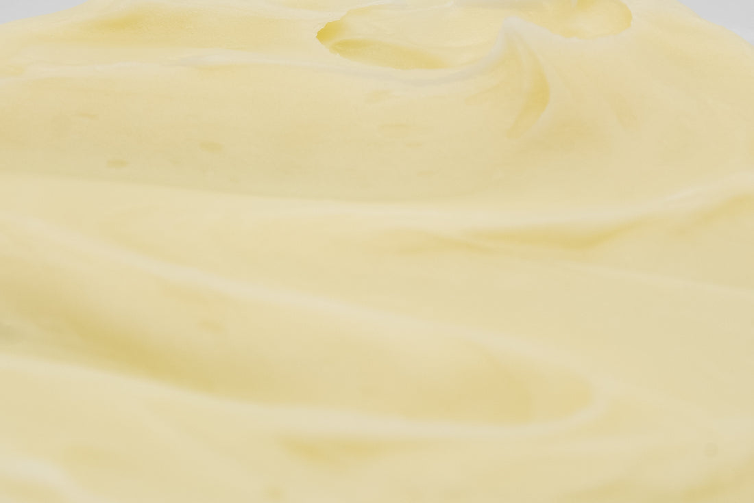 Close-up of pale golden cream texture.