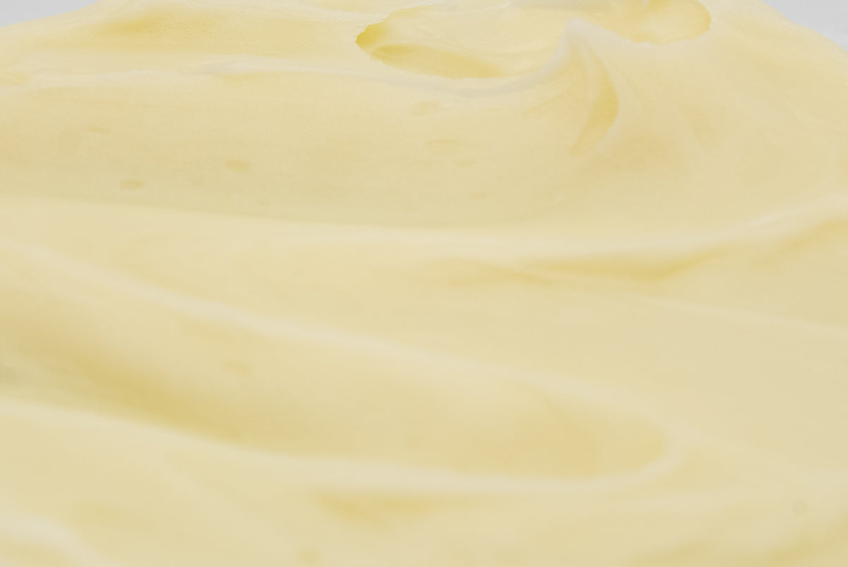 Close-up of pale golden cream texture.