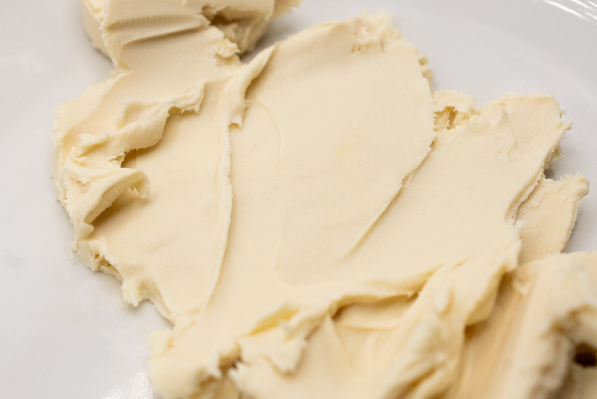 Close-up of pale golden cream texture.