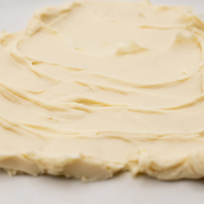 Close-up of pale golden cream texture.